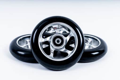 Universal Rollerski Wheels Set of three universal rollerski wheels, showcasing their sleek design, high-performance construction, and compatibility with brands like FF, IDT, Swenor, Swix, and Fischer.