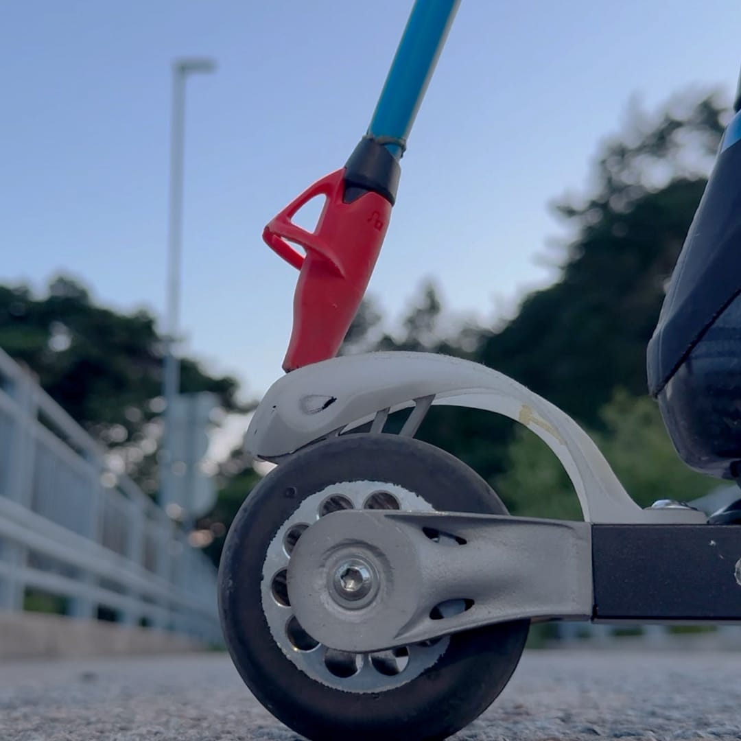 man in the sun working with rollerskis