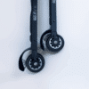 ff-360-with-safe-break Close-up of two "FF Skis" scooter wheels, black with silver accents, mounted on a black "FF 660" frame. One wheel features a visible brake mechanism.