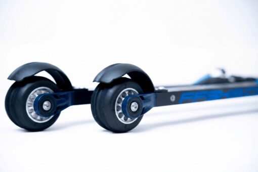 ff-360-flow-classic-suspension Close-up of a roller ski showing two black rubber wheels with blue aluminium hubs on a black frame