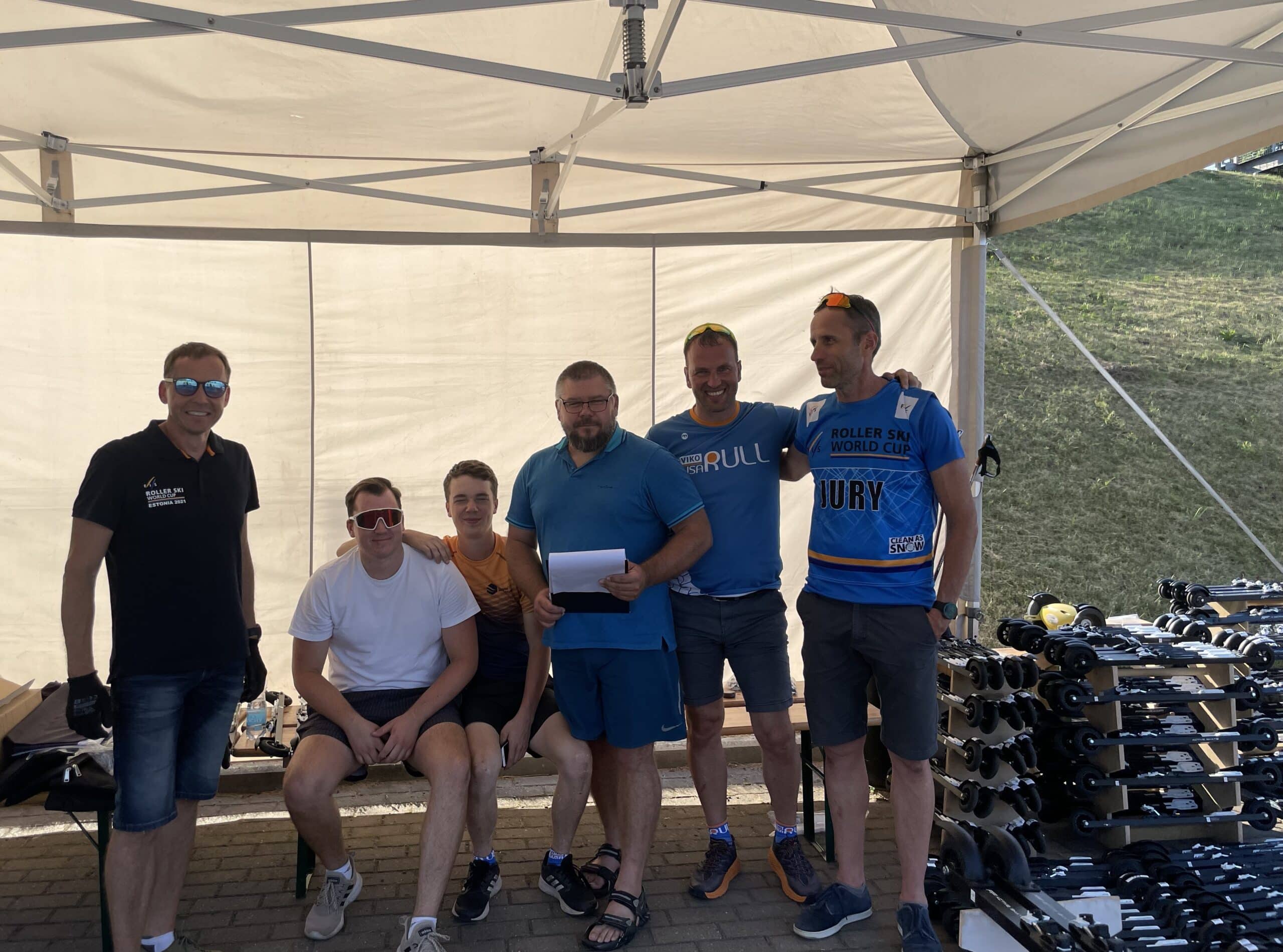 The FF Skis team in Estonia during a rollerski event, showcasing teamwork and innovation