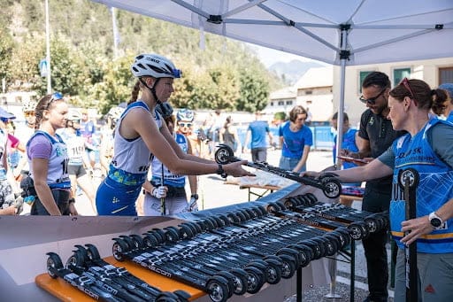 FIS event in Val di Fiemme, Italy - Participants preparing for roller skiing under a tent